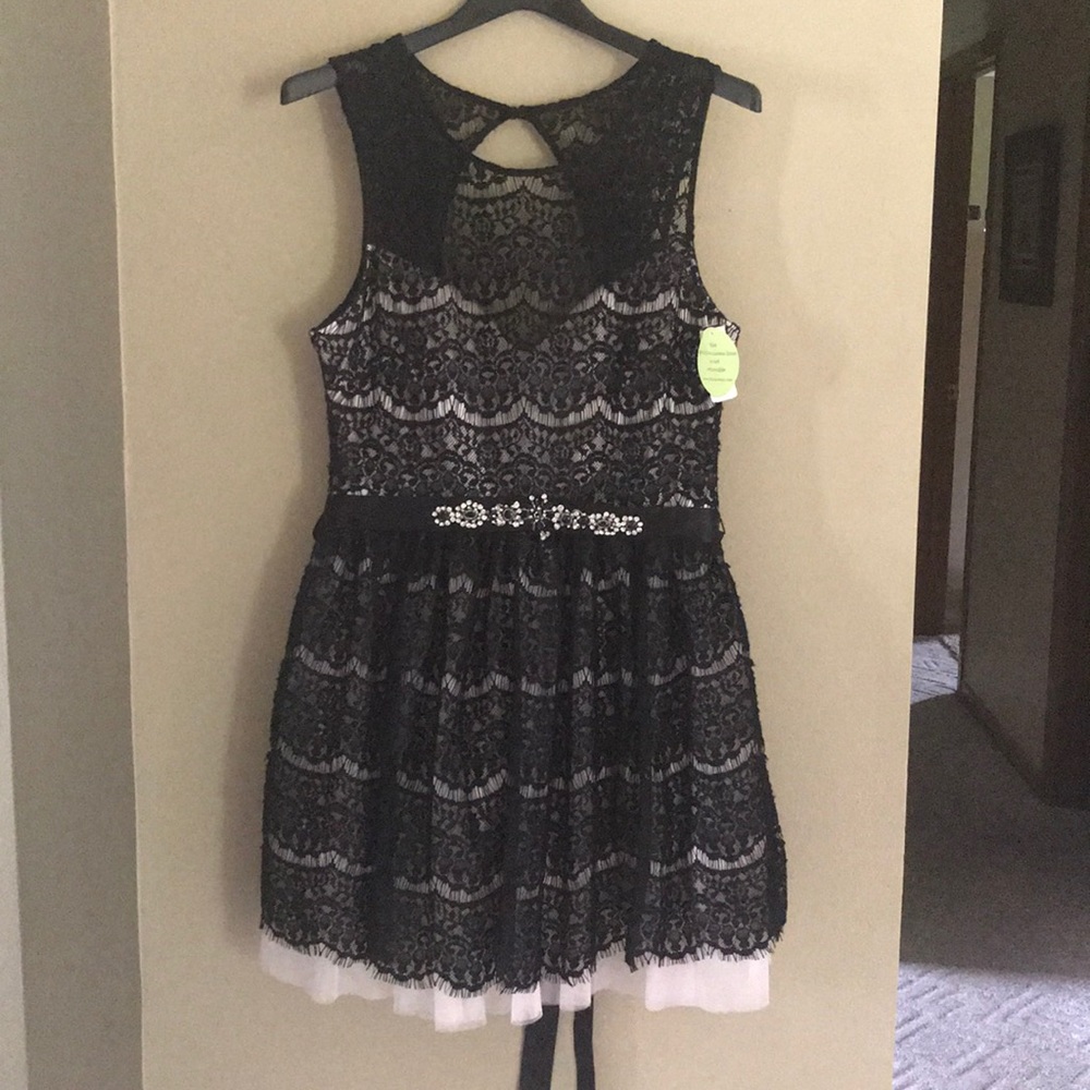 Black lace dress with two jewel belts